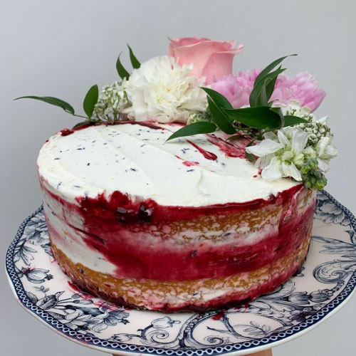 heritage bakery wedding cake with jam and fresh flowers